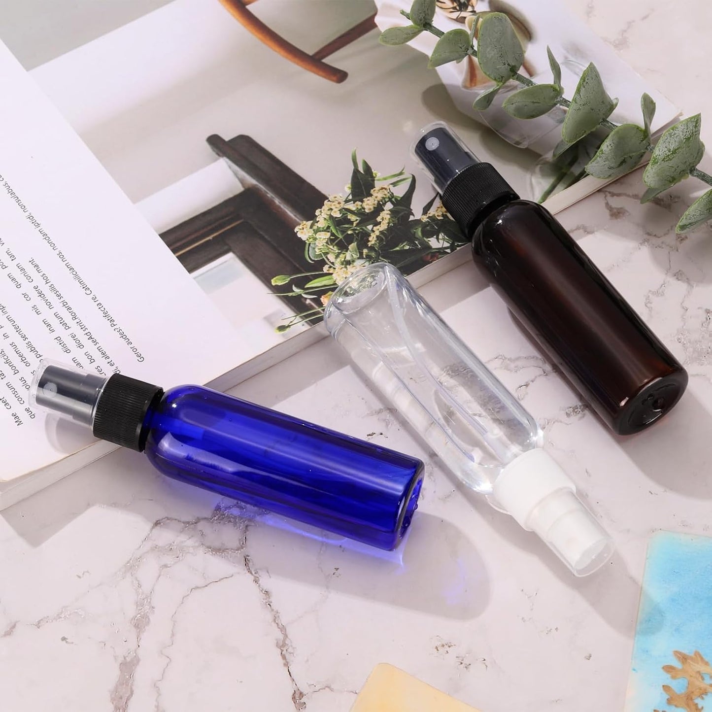 uxcell 20 Pack Spray Bottles, 2 Oz/60ML Reusable Clear Empty Mist Plastic Mini Travel Bottle Set,Small Refillable Liquid Containers for Essential Oil, Cleaning (Blue Black)